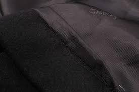 repairing the lining hem on a coat
