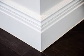 gap between baseboard and tile floor