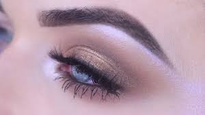 bronze shimmer eye makeup for blue eyes