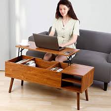 It is mounted on crossed legs and fitted with wheels for easy movement. What Is The Perfect Height Of A Coffee Table Architecture Lab