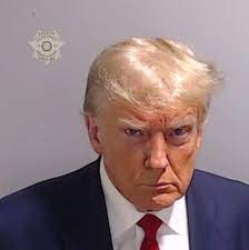 Belligerence and hostility: Trump's mugshot defines modern US politics | Donald Trump | The Guardian
