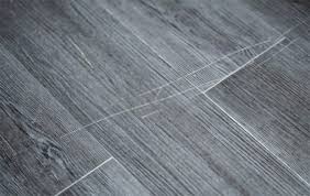 how to fix scratches on laminate floor
