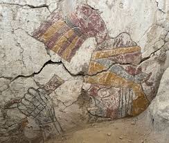 Ancient Murals Of Two Faced Figures