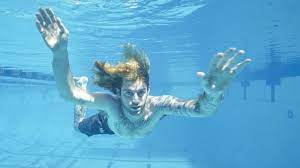 Spencer elden, now 20, recreates his pose on nirvana's nevermind album cover. Nirvana Sued By The Baby From Nevermind S Album Cover Bbc News