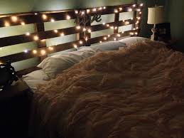 Check out this diy pallet headboard design to put at the head of your bed, exclusively made of pallets with so many optional features. Pallet Headboard And Twinkle Lights Diy Headboard With Lights Pallet Headboard Diy Headboard Wooden
