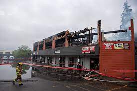 two alarm fire destroys businesses in
