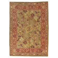 large antique oushak rug in taupe