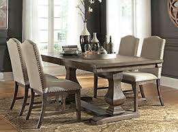 $94.64 (11 used & new offers) Johnelle Extendable Dining Table Ashley Furniture Homestore