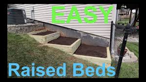 diy raised garden beds on a slope