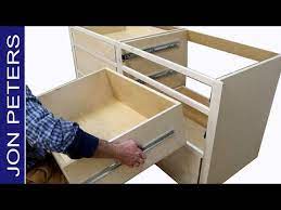A kitchen adorned with gray cabinets, and the right matching colors, is far from dull or depressing. How To Build Kitchen Cabinets Install Drawer Slides Youtube