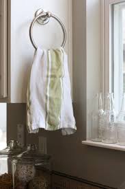 That's why you might want to consider adding exposed towel bars into your kitchen design. Feature Friday My Kitchen House Tweaking Kitchen Towel Holder Kitchen Sink Accessories Kitchen Towels Hanging