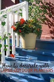 decorate with large outdoor planters