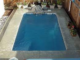 This small pool has a unique shape but plenty of seating for everyone. Florida Concepts Pools Inc Inground Fiberglass Swimming Pool Designs By Viking Pools For Wes Fiberglass Swimming Pools Indoor Swimming Pools Swimming Pools