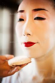 white face geisha makeup stock photo by