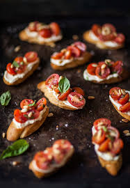 Broil until cheese starts to melt, 1 to 2 minutes. Tomato And Basil Crostini With Whipped Goats Cheese Drizzle And Dip