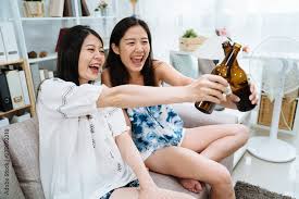 friends toasting drinking beer
