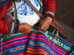 hands of peruvian woman making alpaca