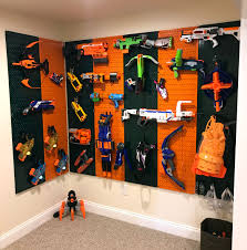 Here is a real simple diy nerf gun storage rack system for under $$20.00 bucks. Fun Pegboard For Toys Toy Rooms Kids Room Organization Boys Playroom