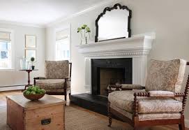 white fireplace mantle with black brick
