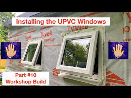 installing upvc windows into a timber