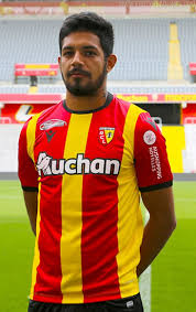 Ignatius ganago (lens) right footed shot from the right side of the box is saved in the centre of the goal. Rc Lens 20 21 Heimtrikot Veroffentlicht Nur Fussball