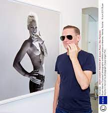 Bryan Adams laughs at nude Pink portrait