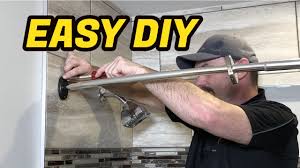 how to install shower rod into tile