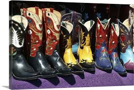 display of colorful cowboy boots wall