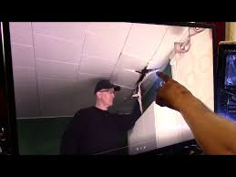 sagging ceiling tile cause and fix