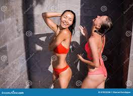 Young Girls Showering Stock Photos 