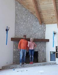 No more 70's stone fireplace! Makeover How We Replastered Our Mountain House Stone Fireplace