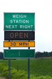 trucks have to stop at weigh stations