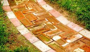simple brick walkway through grass