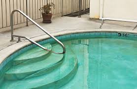 remove stains from a plaster swimming pool