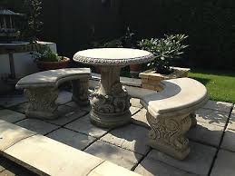 new garden table and benches concrete