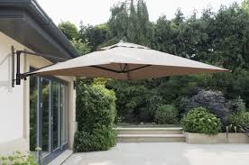 Expand the possibilities of your outdoor space with cantilever parasols that remove the centre pole from the equation. Cantilever Taupe Parasol Wall Mounted Capri Avant Garden Guernsey