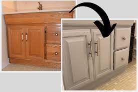 Keeping your bathroom organized and clean isnt easy if you dont have basic builder bathroom cabinets get new life with a contemporary paint color and new hardware. How To Paint A Bathroom Vanity Love Remodeled