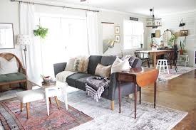 layering rugs on top of other rugs in