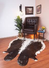 large cowhide rug brown black white cow