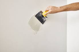 how to fix small holes in drywall