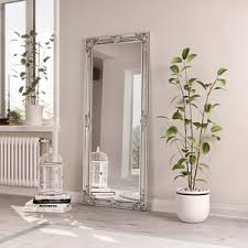 The 1.75 inch sleek, modern frame is given a glossy black finish. Full Length Floor Mirrors Large Free Standing Mirrors The Range