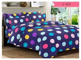 Colourful Polka Dots On Blue Bed Sheet