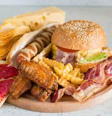 While eating hamburgers, sandwiches or pizzas; Junk Food And Diabetes The Link The Effects And Tips For Eating Out