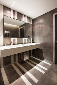A lot goes into planning a commercial bathroom design. Mi 160512 19 Contemporist Public Restroom Design Restroom Design Commercial Bathroom Designs
