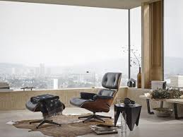 When the set was introduced in 1956, there was nothing like it, and there is still nothing to equal it. Vitra Lounge Chair Ottoman Walnut With White Pigmentation Leather Premium Snow 84 Cm Original Height 1956 Aluminium Polished By Charles Ray Eames 1956 Designer Furniture By Smow Com