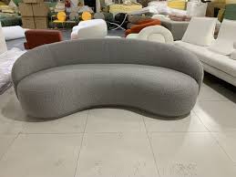curved slate grey boucle 3 seater sofa