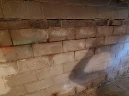 leaking basement and bowing wall fix in