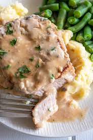I make a package of stovetop stuffing mix as directed, cut a slit in the center of the chop to make a pocket (parallel to the cutting board if the chop is laying flat) and fill the pocket with stuffing. Cream Of Mushroom Pork Chops Baked Kitchen Gidget