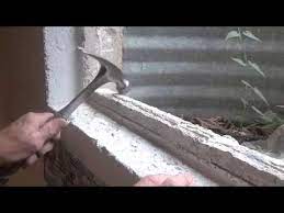 repair a basement window frame