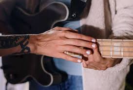Why Do Guitarists Paint Their Nails